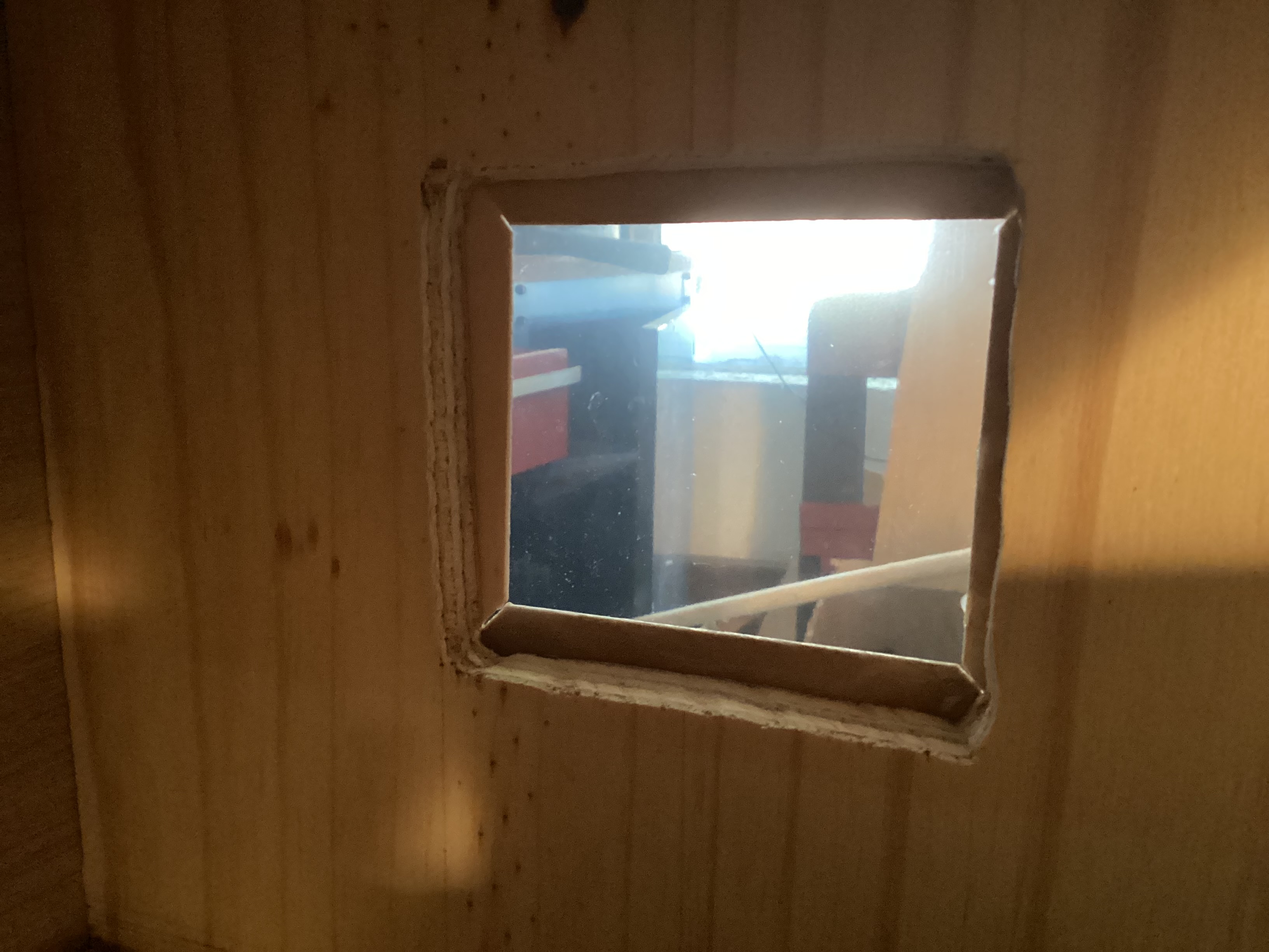 inside view of window, showing frame covering up rough edges